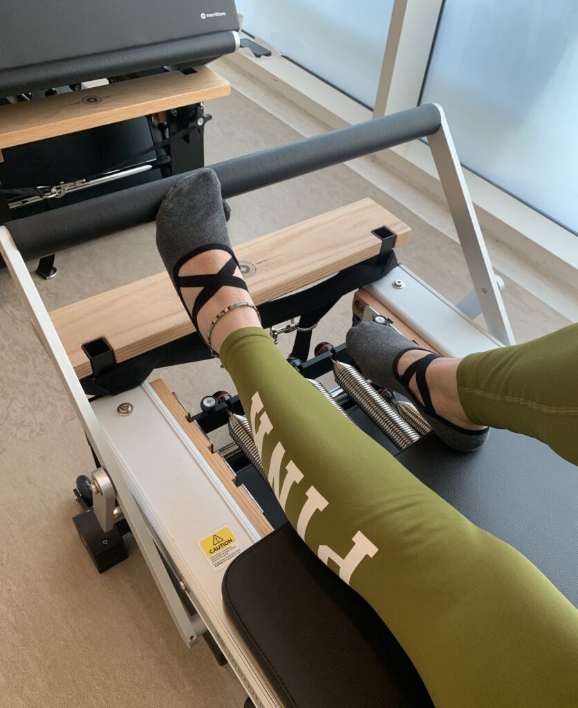 I Tried Pilates Reformer, and My Core Has Trust Issues Now