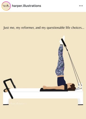 A lady on the pilates reformer with feet in straps